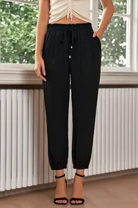 Women's black high-waisted drawstring jogger pants in a comfortable casual style