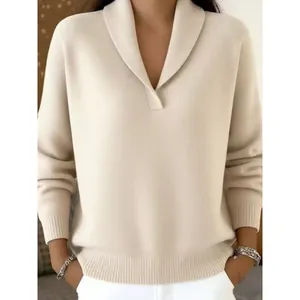 Elegant beige V-neck long-sleeve knit pullover with ribbed texture and loose fit