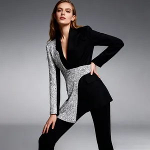 Elegant women's patchwork blazer with black fabric and shimmering silver sequins.