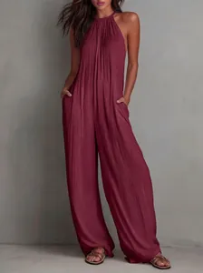 Elegante tuta bordeaux a gamba larga con scollo all'americana e pieghe per le vacanze