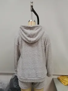 Back view showing the texture of a soft grey fleece hooded loungewear set for women