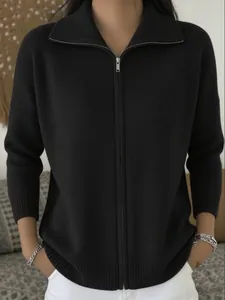 Casual black knit zip-up cardigan with lapel collar and ribbed texture for women