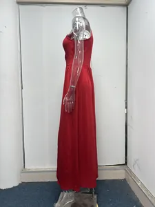 Detailed side silhouette of a red one-shoulder dress shown on a clear mannequin