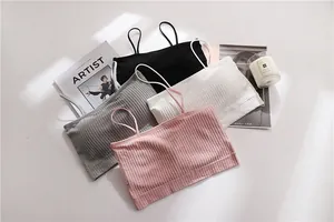 Detailed macro view of multi-color seamless ribbed tube tops with elastic straps