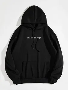 Black fleece hoodie for women featuring 'you are enough' print and pocket