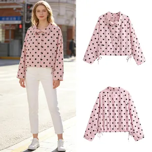 Pink polka dot jacket with drawstring collar and buttons, front and back detail view