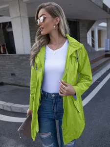 Close-up detail of a vibrant lime green hooded raincoat for women with a full-zip closure.