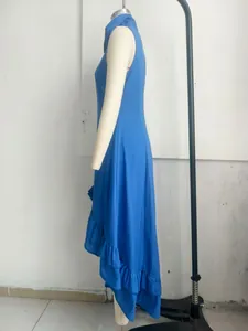 Side view of a vintage blue ruffle hem sleeveless dress featuring a front zipper detail
