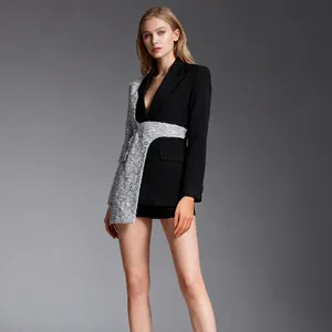 Close-up of women's blazer featuring unique black and silver sequin contrast design