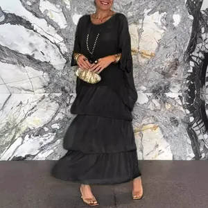 Elegante zwarte chiffon maxi-jurk met vleermuismouwen en gelaagde rok voor dames