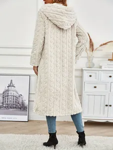 Back view of a cozy long beige hooded fleece coat featuring a unique textured pattern
