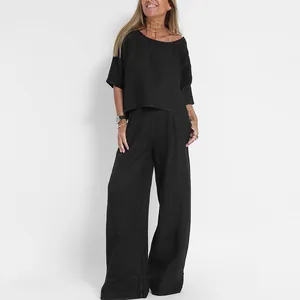 Zweiteiliges schwarzes Set für Damen mit kurzärmeligem Oberteil und weiter Hose