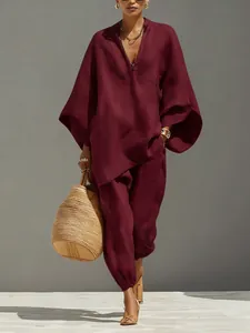 Elegantes weinrotes zweiteiliges Set mit Fledermausärmel-Oberteil und weit geschnittener Hose