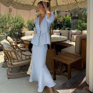 Elegant light blue summer set with puff sleeve tie-front top and high waist maxi skirt