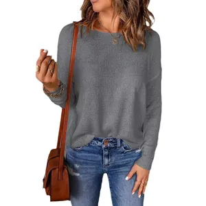Elegant women's casual grey long-sleeved knitted sweater with relaxed fit for autumn