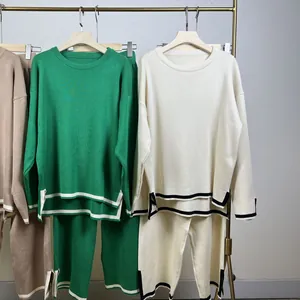 Two-piece knitwear set with contrast color slit sweater and wide-leg pants in various colors
