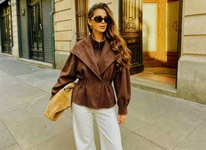 Retro style brown faux suede jacket with a cinched waist for a flattering slim fit