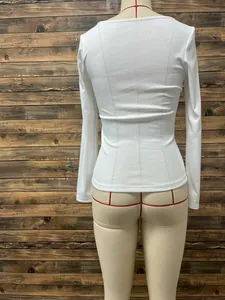 Back view of white ribbed slim fit long sleeve t-shirt showing detailed fabric texture