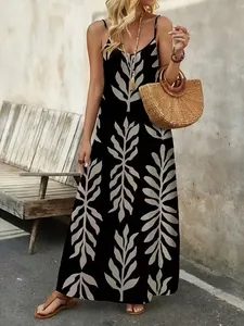 Vestido largo bohemio negro con estampado de hojas para unas vacaciones de verano
