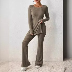 Elegant two-piece ribbed knit lounge set with long sleeve slit top and flared pants
