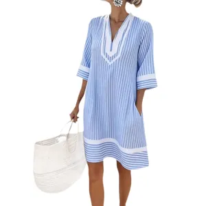 Light blue and white striped V-neck beach dress with loose fit and functional side pockets