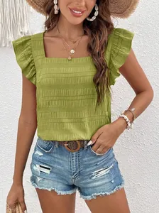 Detail view of avocado green square neck top with ruffle sleeves and textured fabric