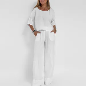 Damen weißes zweiteiliges Leinen-Set mit Kurzarm-Oberteil und eleganter weiten Hose