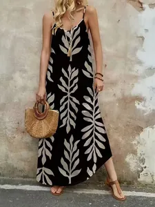 Elegante vestido largo bohemio con estampado de hojas y tirantes para vacaciones
