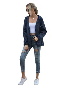 Full body view of a navy blue lightweight hooded zip-up windbreaker jacket for women