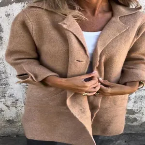 Close-up of khaki lapel cardigan featuring single-breasted buttons and pockets