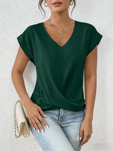 Close-up of elegant dark green V-neck T-shirt with stylish twist front detail