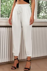 Stylish white high-waisted drawstring jogger pants with elastic cuffed hems for women