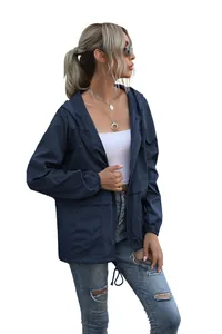 Side view of navy blue lightweight waterproof hooded jacket for women outdoor hiking