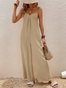 Elegante tuta bohémien beige con scollo a V e gamba larga per le vacanze estive