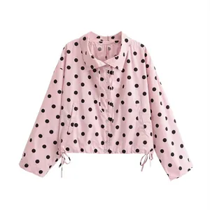 Stylish pink polka dot jacket for women featuring a drawstring hem and button-down front