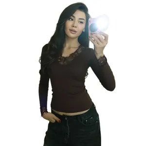 Elegant women's V-neck long sleeve crop top featuring delicate lace trim in dark brown