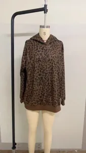 Vintage leopard print oversized hoodie with corduroy texture and soft drawstring hood
