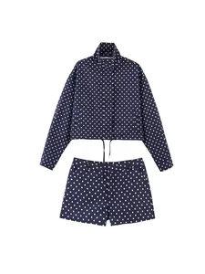 Marineblaues Punkt-Zweiteiler-Set mit stylischer Kordelzug-Jacke und passenden Shorts