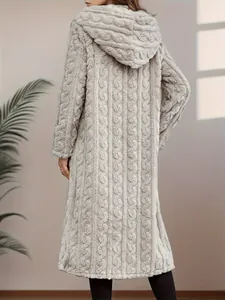 Detailed back view of a long light grey hooded plush coat featuring soft cable-knit pattern.