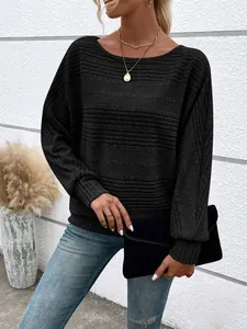 Detailed texture of black long-sleeved crew neck top for casual autumn style wear
