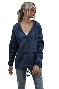 Women's lightweight navy blue outdoor hiking jacket with zipper and hood detail