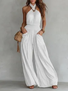 Elegant bohemian white backless sleeveless wide-leg jumpsuit with shirred waist and pockets