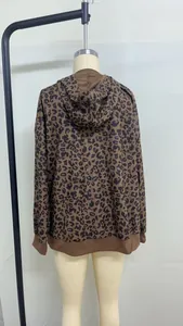 Back view of a leopard print corduroy hoodie for women on a mannequin display.