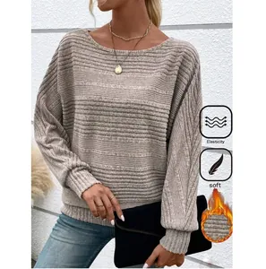 Detail view of women's ribbed long sleeve top showing soft texture and elasticity.