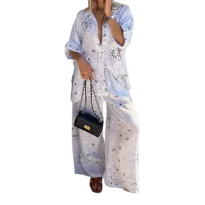 Lässiges weißes Set aus bedruckter Lochmuster-Bluse und weiter Hose für Damen