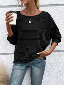Detail of comfortable long-sleeve round neck black sweater for autumn and winter