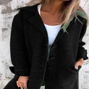 Detailed close-up of women's black mid-length cardigan with lapel, buttons, and pockets