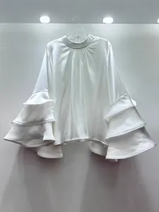 Elegant French white blouse with tiered ruffle sleeves and smooth satin-like finish