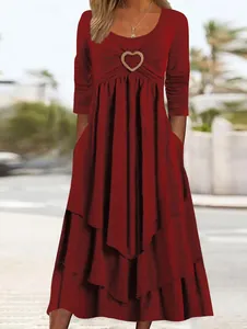 Burgundy long sleeve casual dress featuring heart decor and layered tiered cake skirt
