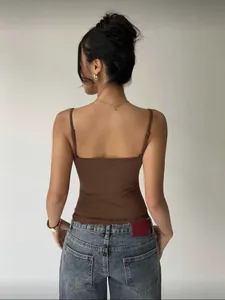 Back view of women's slim brown camisole with delicate lace trim at the hem